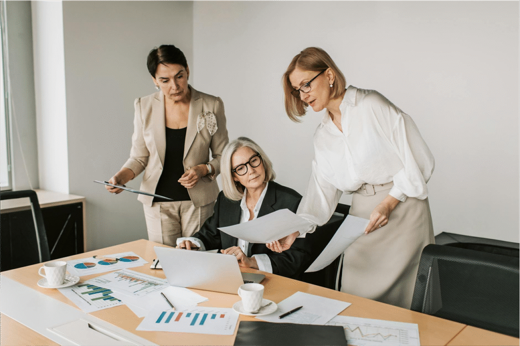 3 ladies working on strategy